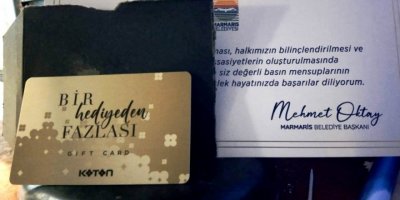 BELEDİYE BAŞKANINDAN GAZETECİLERE '500' LİRALIK ALIŞVERİŞ ÇEKİ